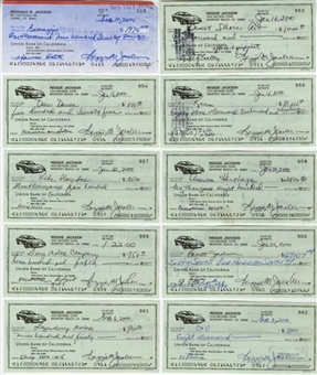 Collection of (100) Signed Reggie Jackson Personal Checks